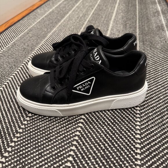 Iconic Prada sneakers (size 37) Black leather, white souls from Florence, Italy - Picture 1 of 6